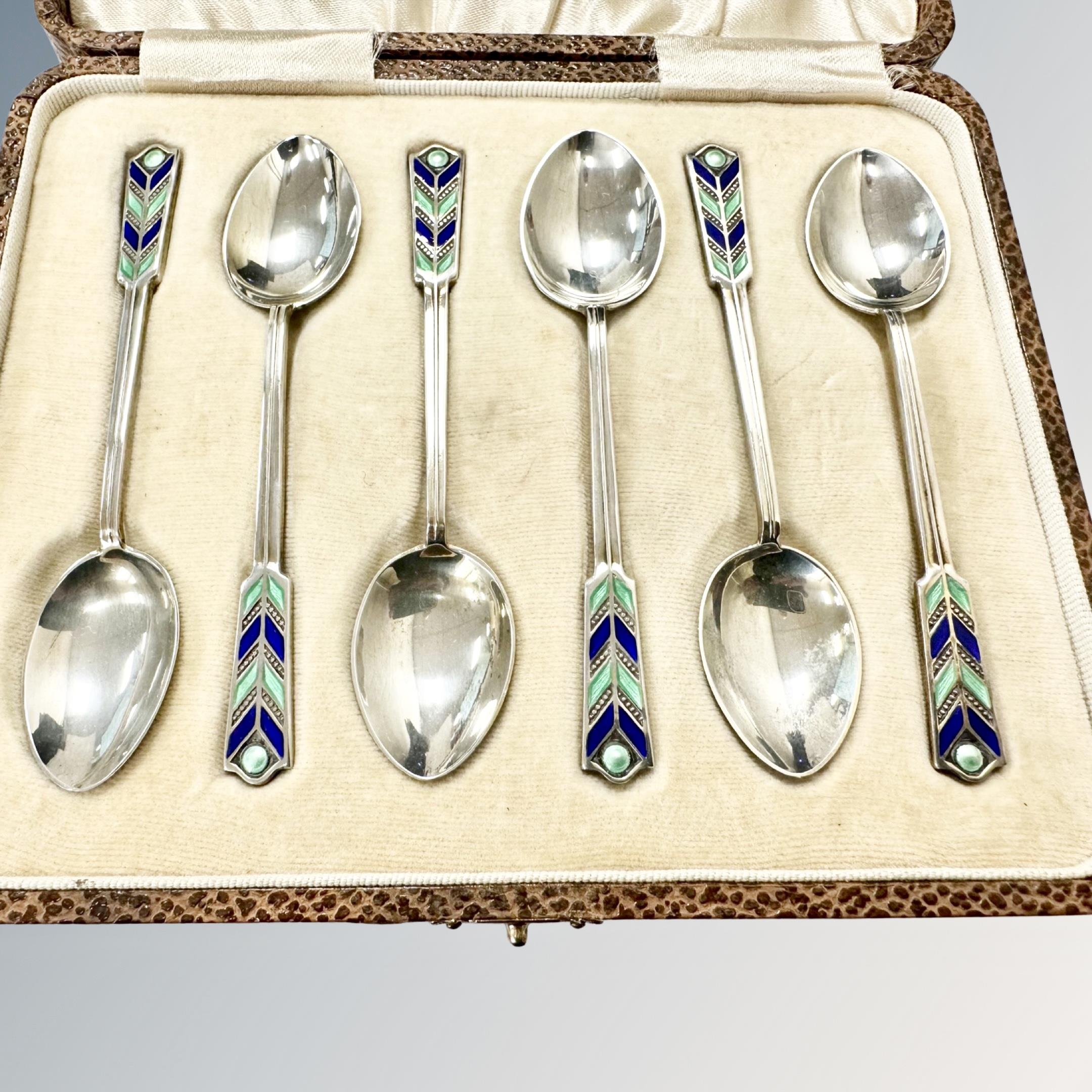 An Art Deco set of six silver and enamel teaspoons, William Hutton & Sons, Birmingham 1931, cased. - Image 2 of 2