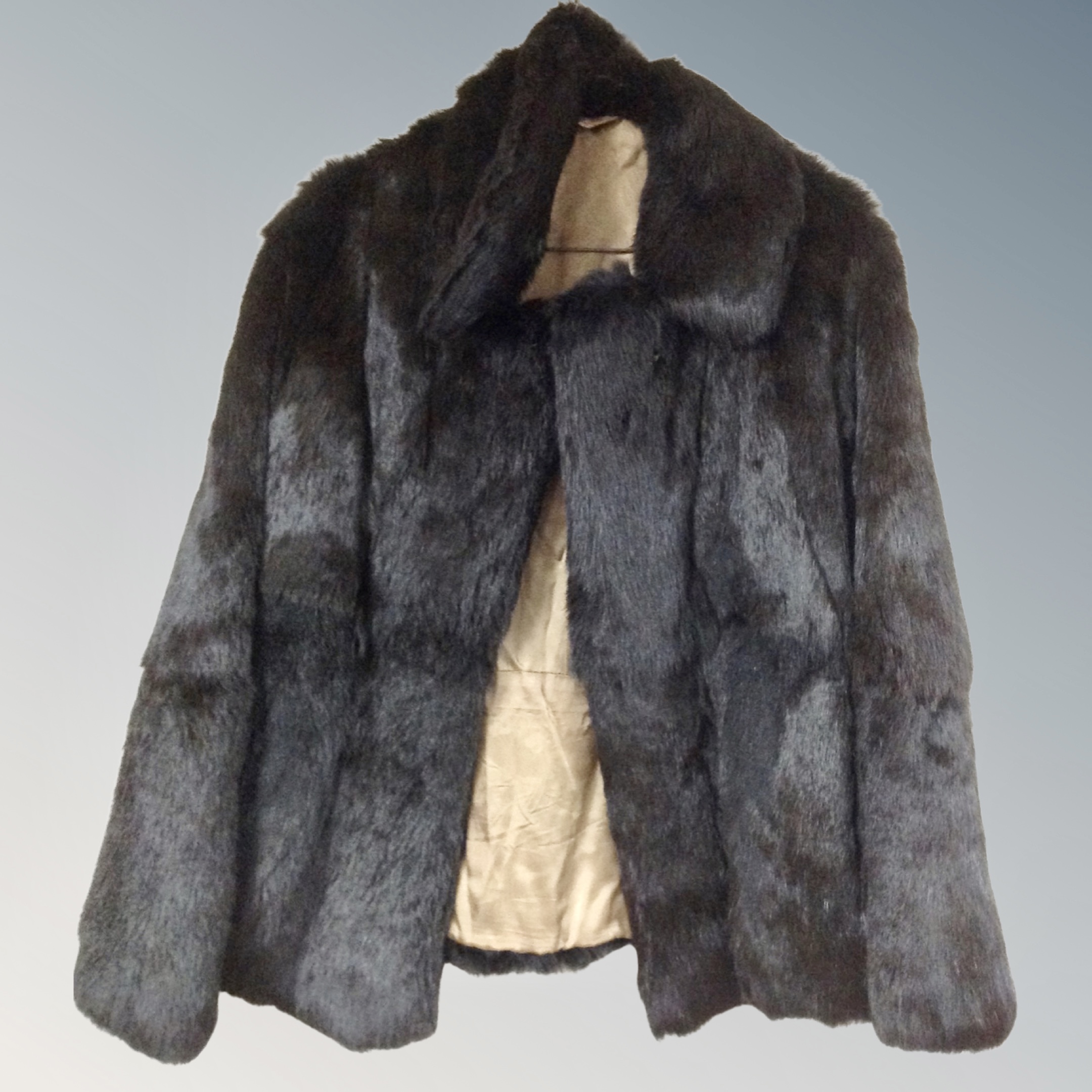 A vintage dark brown fur coat