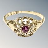 An 18ct gold ruby and diamond cluster ring, size R. CONDITION REPORT: 2.8g.