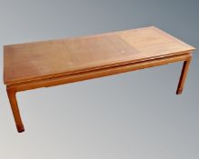 A 20th century teak coffee table in Oriental style.