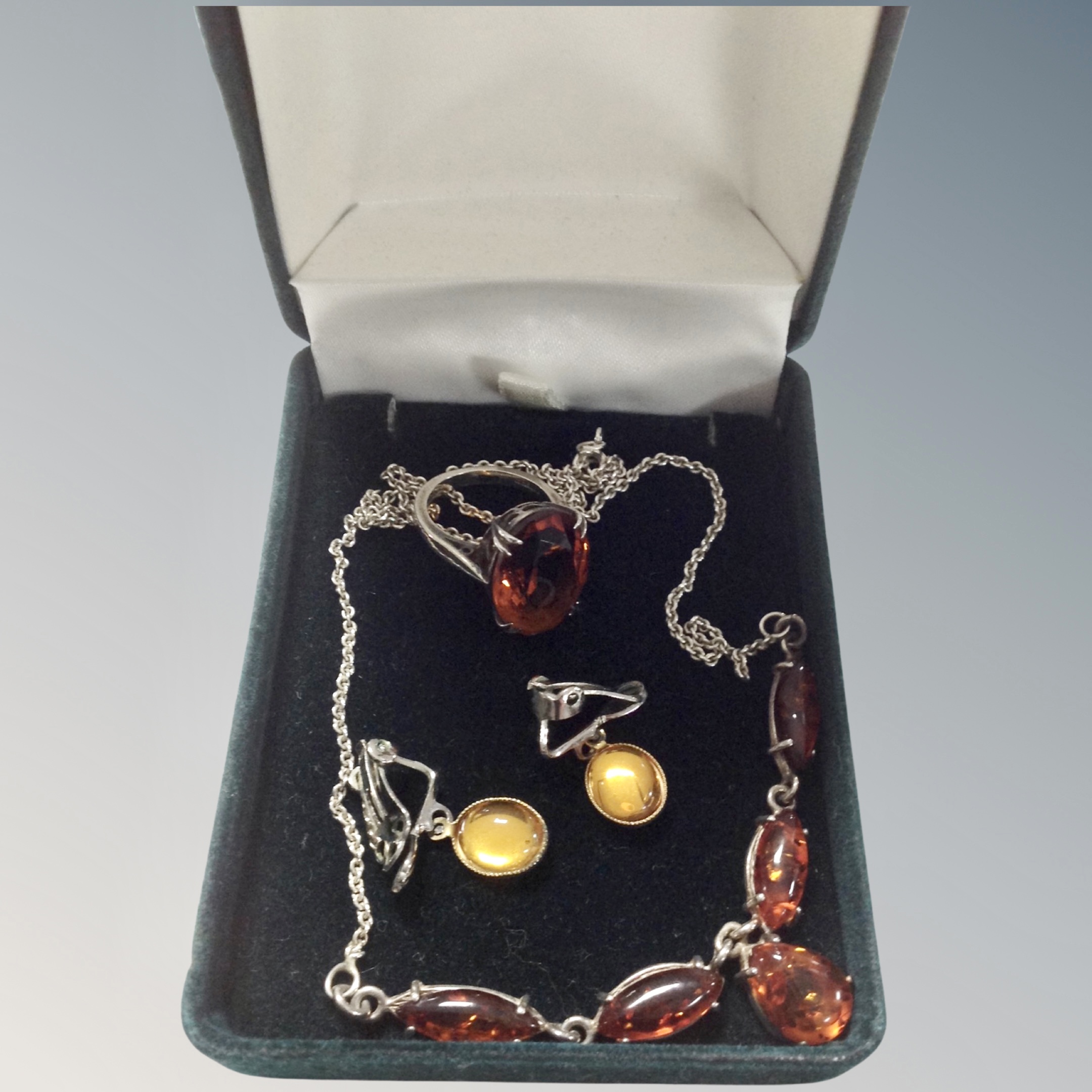 A silver and amber ring and matching necklace, - Image 2 of 2