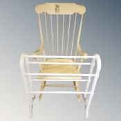 A painted spindle backed rocking chair together with a further painted towel rail