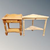 A contemporary pine two tier side table fitted a drawer together with a further pine corner table