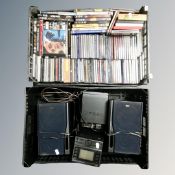 Two crates of assorted cds and dvds together with JVC micro hifi