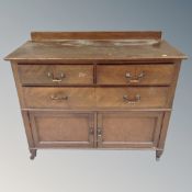 A 19th century mahogany dressing chest on raised legs