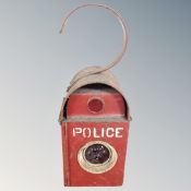 A vintage Police signalling lamp