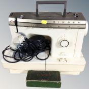 A 20th century Singer 258 electric sewing machine in case with box of Singer accessories