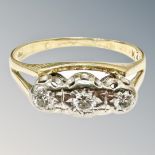 An 18ct gold and platinum three-stone diamond ring,