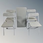 A Vango folding table together with four chairs