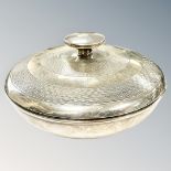 A silver and Bakelite-lined circular lidded dish, Birmingham marks, diameter 11cm.