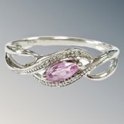 A 9ct white gold diamond and pink topaz ring, size R CONDITION REPORT: 2.