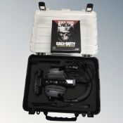 A case of Turtle Beach gaming headphones on stand together with a copy of Call of Duty Infinite