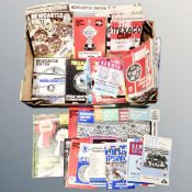 A box containing a quantity of Newcastle United 1970's home and away programmes