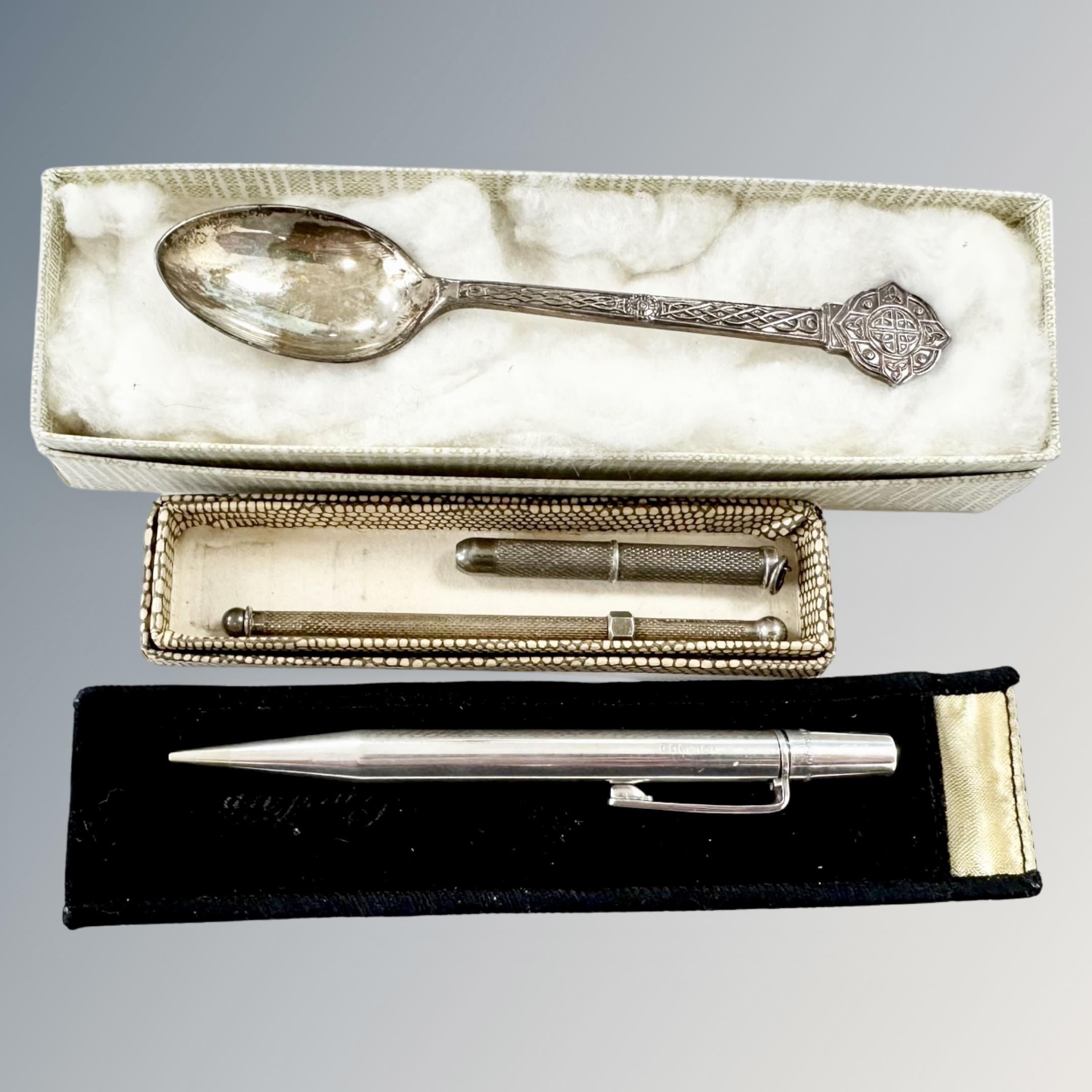 A silver 'Yard o' Lette' propelling pencil, a swizzle stick,