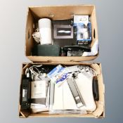 A box of Nintendo Wii with leads and games together with Wii fit board, box of digital cameras,