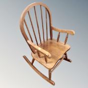 A child's beech rocking chair