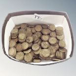 A box of three pence pieces