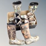 A box of four pairs of camouflage gent's boots and Wellingtons