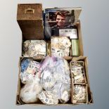 Two boxes containing a large quantity of loose stamps, an album of first day covers, magnifiers,