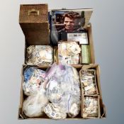 Two boxes containing a large quantity of loose stamps, an album of first day covers, magnifiers,