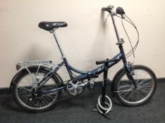 A Raleigh Airlite Evo 7SP folding bike with pump