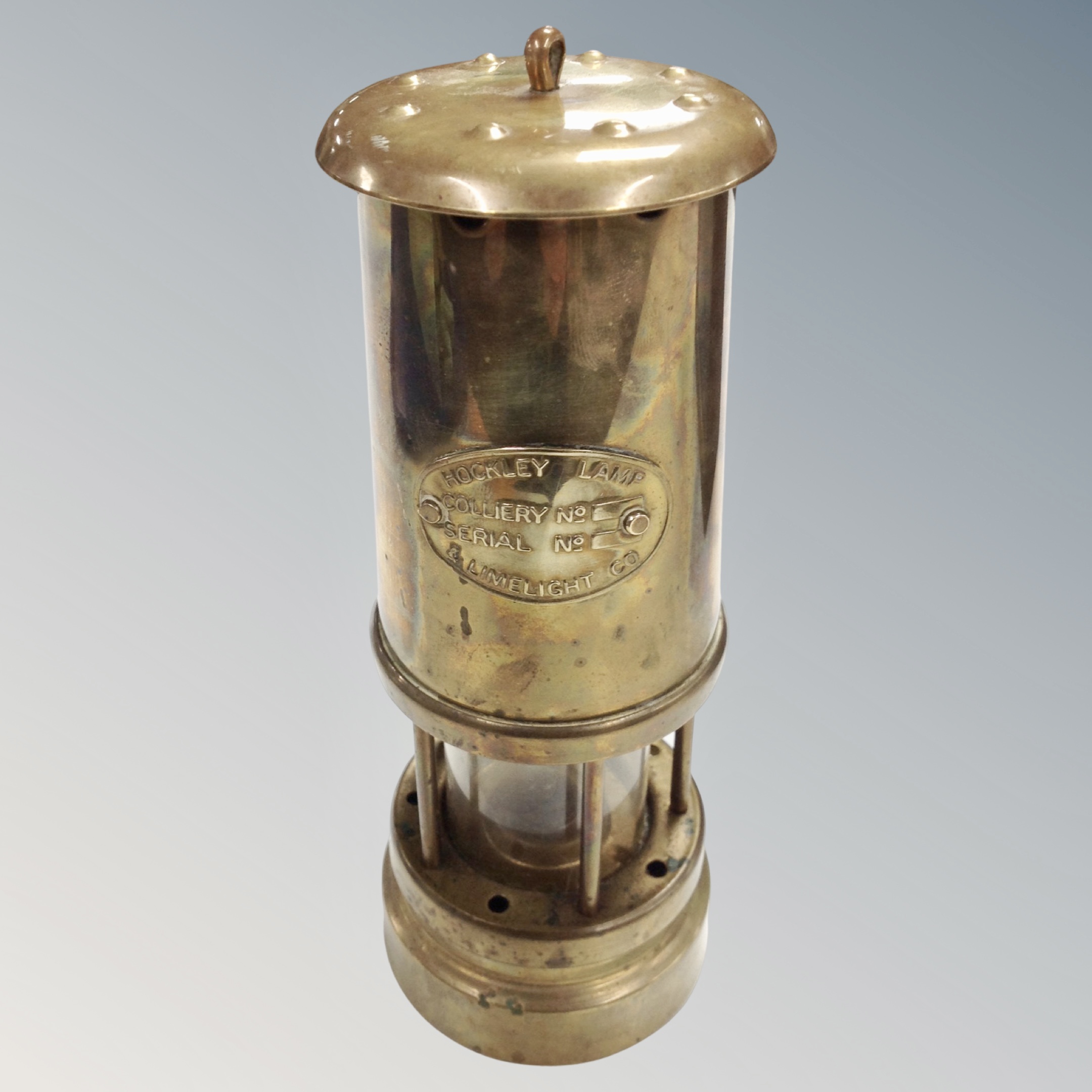 A Hockley Lamp & Limelight Company brass miner's lamp