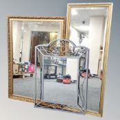 Two gilt framed mirrors together with a metal framed Art Nouveau style mirror