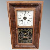 A 19th century American wall clock.