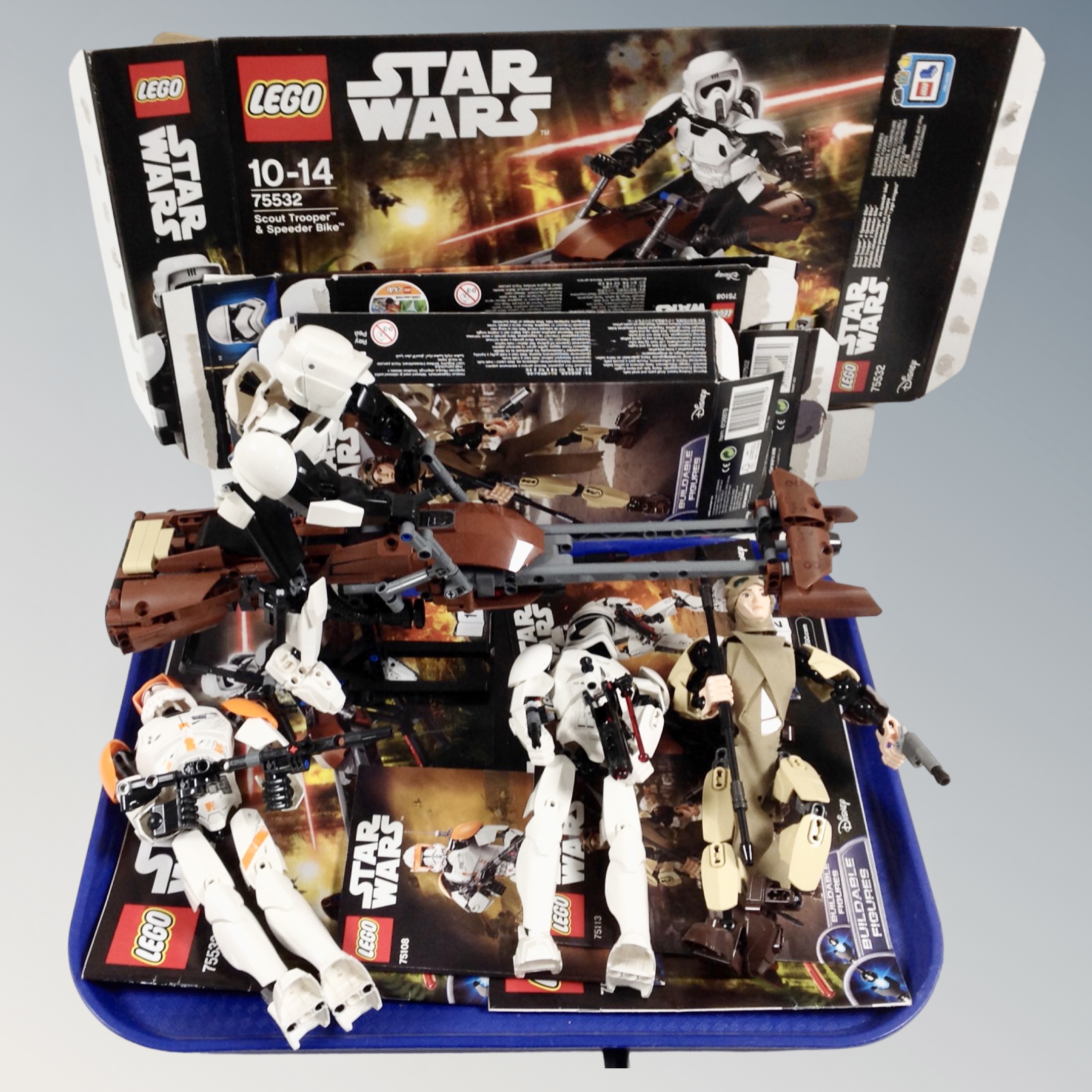 Four Lego Star Wars buildable figures; 75532 Scout Trooper and Speeder, 75113 Rey,