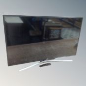 A Samsung 42 inch LCD Smart TV with remote