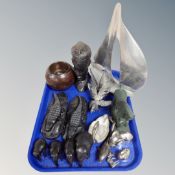 A tray of metal ornaments, carved hardwood African bust and animals,