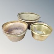 Three 19th century brass cast iron handled pots.