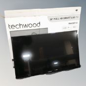 A Techwood 39 inch smart TV with box