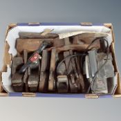 A box of vintage woodworking planes,