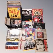 A crate of vinyl LP's and 7 inch singles to include Foreigner, The Cult, U2, Style Council,