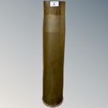 A heavy artillery brass ammunition shell casing, various engraved markings to base,