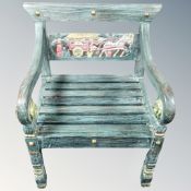 A scroll arm painted armchair