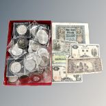 A box of a large quantity of commemorative crowns, George III penny 1797, two £5 coins,