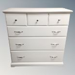 A contemporary six drawer chest