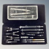 A German Lotter precision drawing set in fitted case together with a further German compass