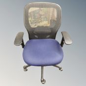 A contemporary blue and black mesh adjustable office chair