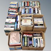 A pallet of eight boxes of hard backed books, history, autobiographies,