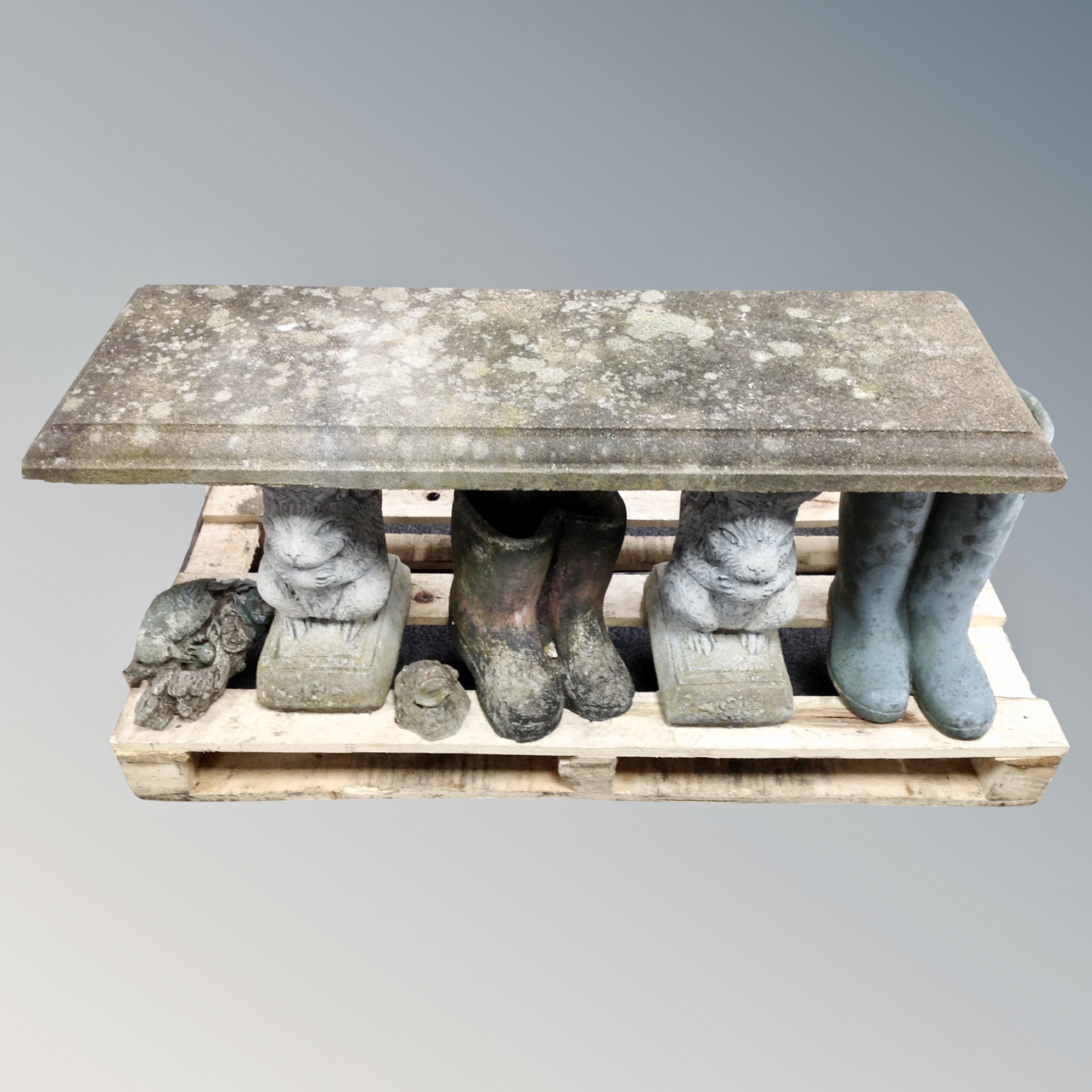 A concrete garden squirrel bench (width 107cm) together with two Wellington planters and two