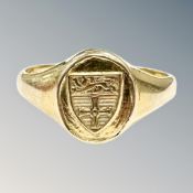A 9ct gold signet ring with engraved crest, size Q CONDITION REPORT: 3.
