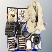 A tray of fishing bag, assorted flies, reels,