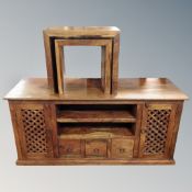 A sheesham wood entertainment stand (width 131cm) together with matching nest of two tables