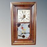 A 19th century American Waterbury Clock Company wall clock.