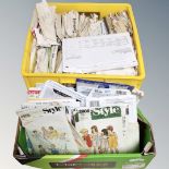 A box of vintage clothes patterns