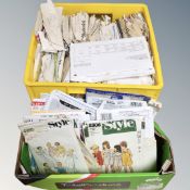 A box of vintage clothes patterns