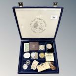 A coin box containing Victorian and later coins, silver £1 and £2 coins,